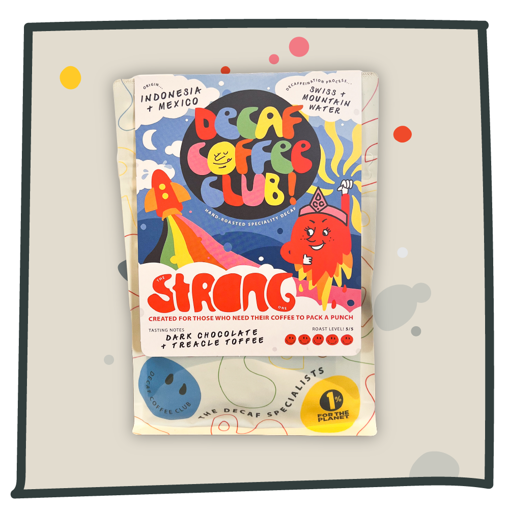 A picture of the strong one decaf coffee on a grey background.