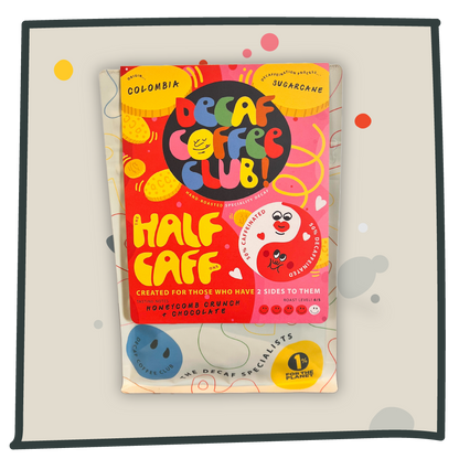 A photo of the half caff coffee bag on a grey cartoon background.